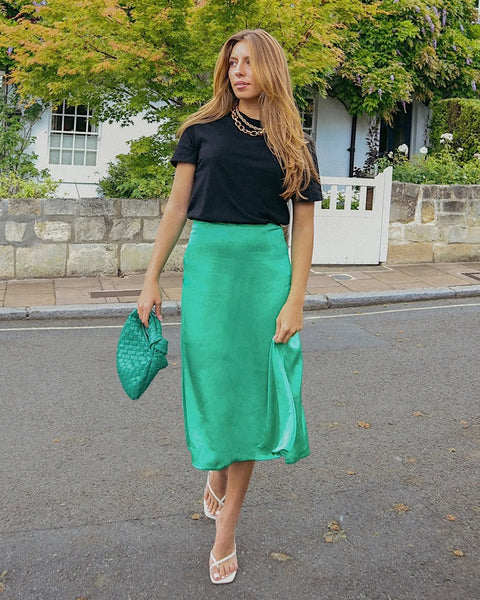 Black and white skirt with green top best sale