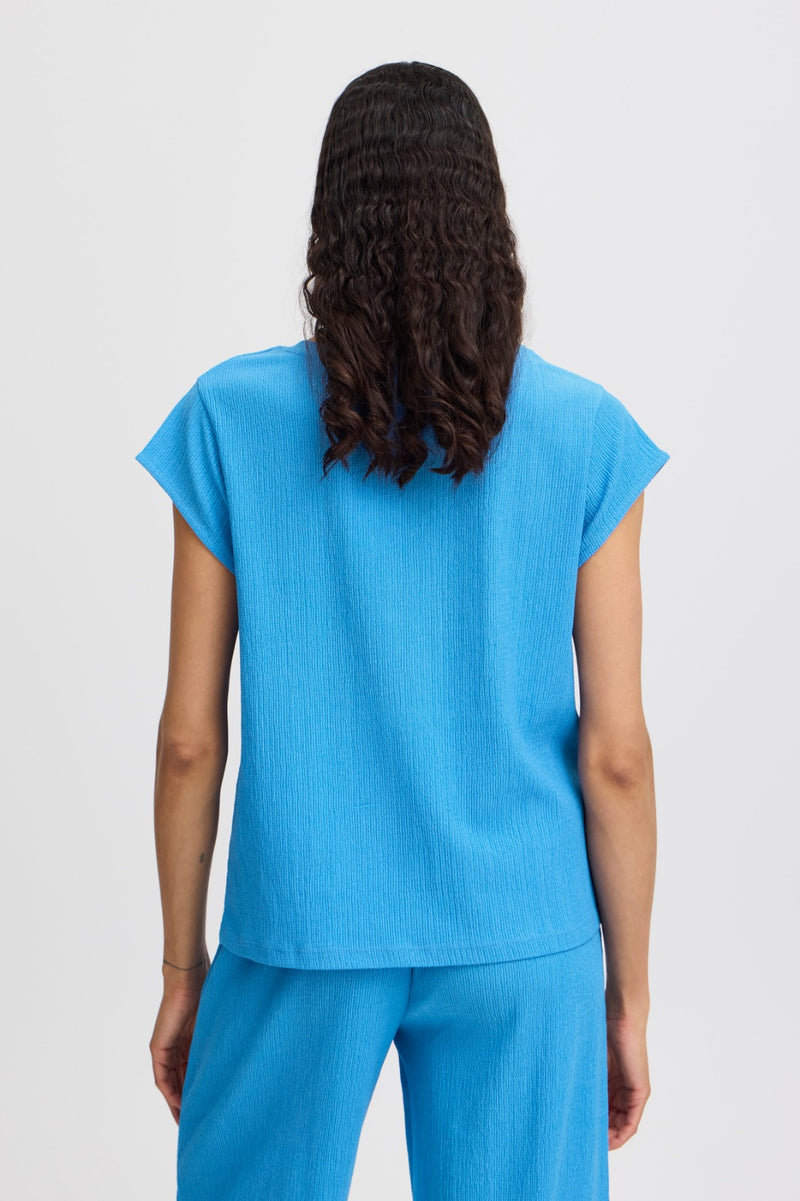 B.Young Palace Blue Top